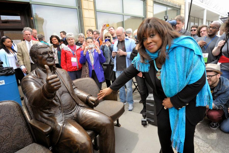 Chaz+Ebert+touches+the+hand+of+the+statue+of+Roger+Ebert+that+was+unveiled+at+Ebertfest+last+year.