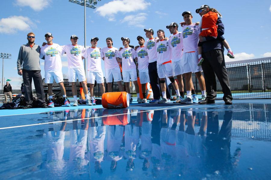 The Fighting Illini mens tennis team sing Hail to the Orange after winning the championship match of the Big Ten Mens Tennis Tournament after the against Ohio State at the Khan Outdoor Tennis Complex, on Sunday. The Illini won 4-0.