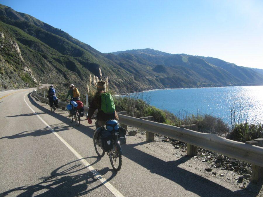 From back to front, Kamilla Kinard, Nora Tien and Ryne Leuzinger on the fifth day of their biking expedition on Dec. 31, 2014, near San Simeon, California.