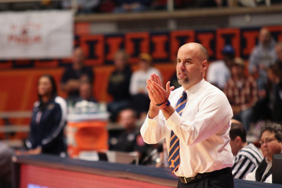 Illinois head coach Matt Bollant applauds his teams performance during the FIghting Illinis 89 to 37 win against Mariam at Assembly Hall, on Tuesday, Oct. 30, 2012.
