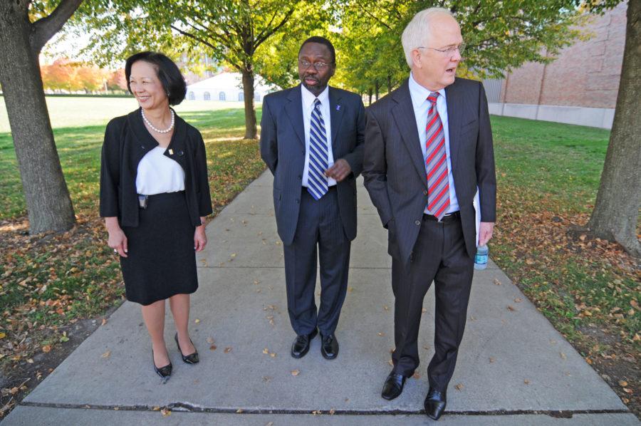 From left to right, Phyllis Wise, UI Chancellor, Ilesanmi Adesida, Dean of the College of Engineering, and Michael Hogan, UI President, wait for governor Pat Quinns car to arrive before the ground breaking for the new Electrical and Computer Engineering building on Friday, Oct. 7, 2011.