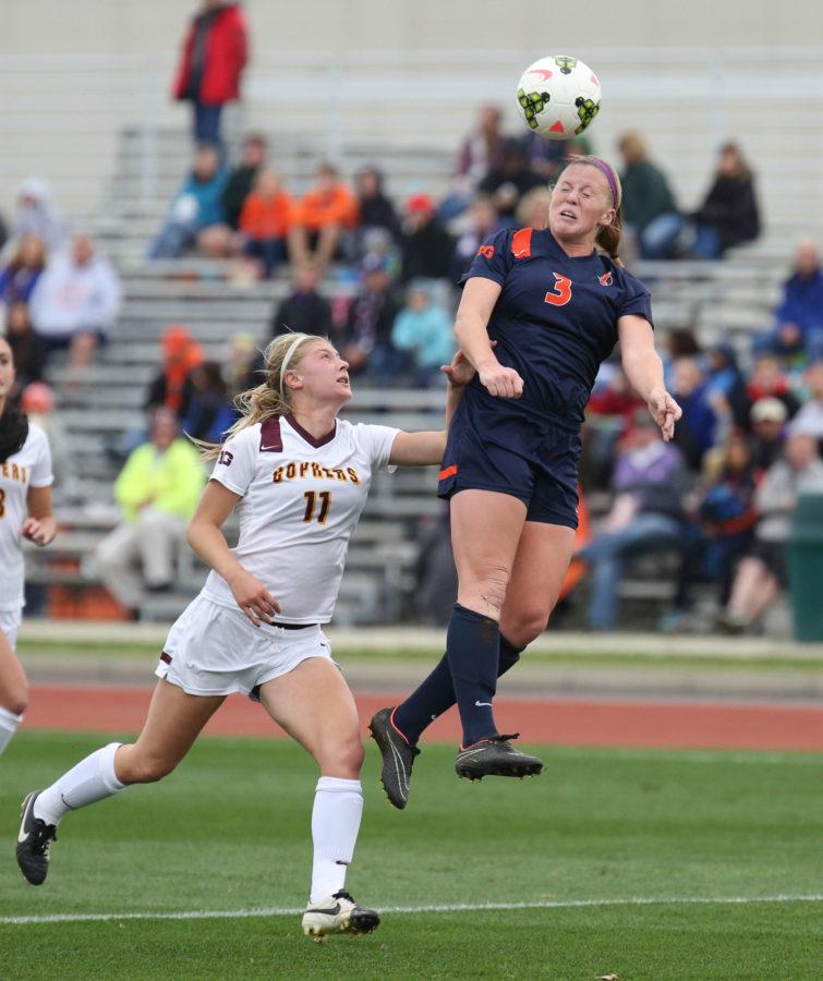 Illinois Janelle Flaws (3) rises to head the ball during the game against Minnesota at Illiniois Track and Soccer Stadium, on Sunday, Oct. 12, 2014. The Illini lost 2-1 in overtime.