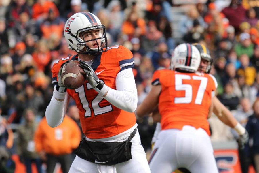 Illinois Wes Lunt winds up for a pass during the game against Iowa at Memorial Stadium on Saturday.
