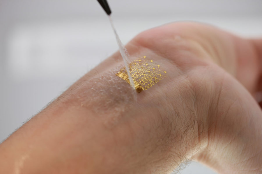 Photo Courtesy of Chad Webb The flexible technology acts similarly to a childs temporary tattoo and adheres to the users skin. John Rogers, professor of materials science and engineering, said his team is interested in working with electronics beyond the capabilities of what current technology that devices use.