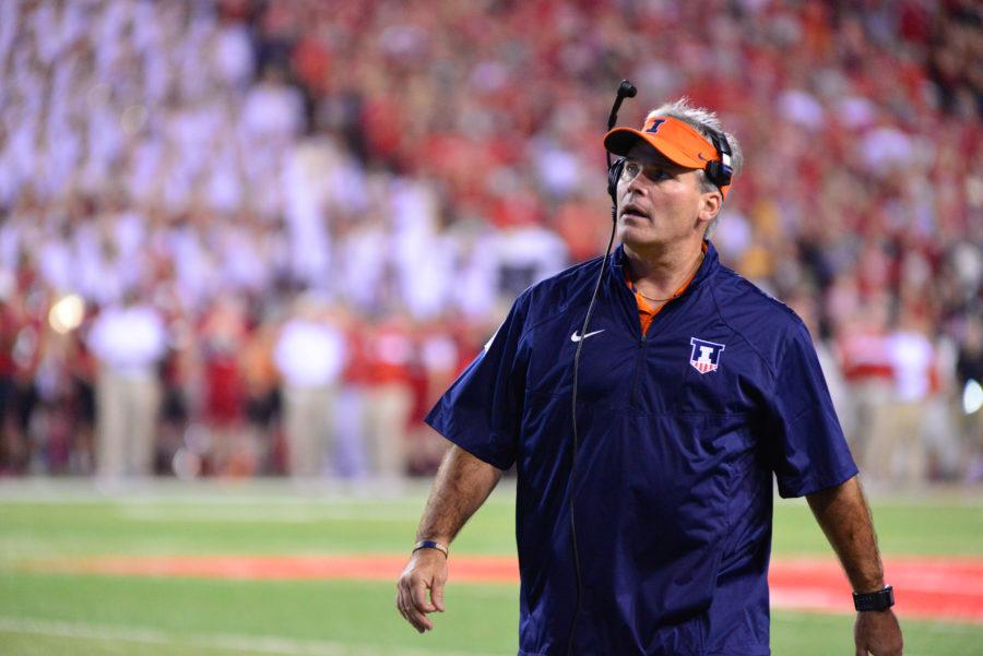 Illinois Head Coach Tim Beckman looks up at the scoreboard during the game against Nebraska at Memorial Stadium in Lincoln, Neb. on Saturday, Sept. 28, 2014. The Illini lost 45-14.