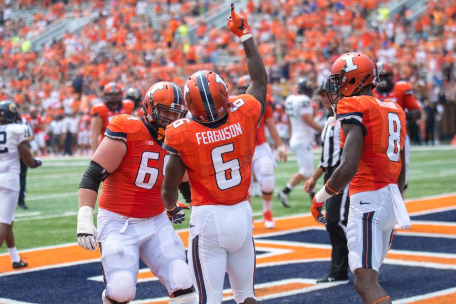 Illinois running back Josh Ferguson celebrates after scoring a touchdown in the game against Kent State at Memorial Stadium on Saturday, September 5.