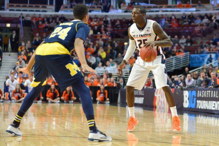 Illinois’ Kendrick Nunn (25) is guarded by Michigans Aubrey Dawkins (24) during the game at United Center in Chicago, Illinois during the Big Ten Tournament on Thursday, March 12, 2015. The Illini lost 73-55.