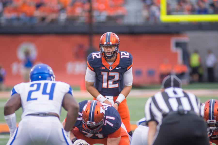 Illinois Wes Lunt readies for the snap during the Illinis 27-25 win over Middle Tennessee State at Memorial Stadium on Sept. 26.