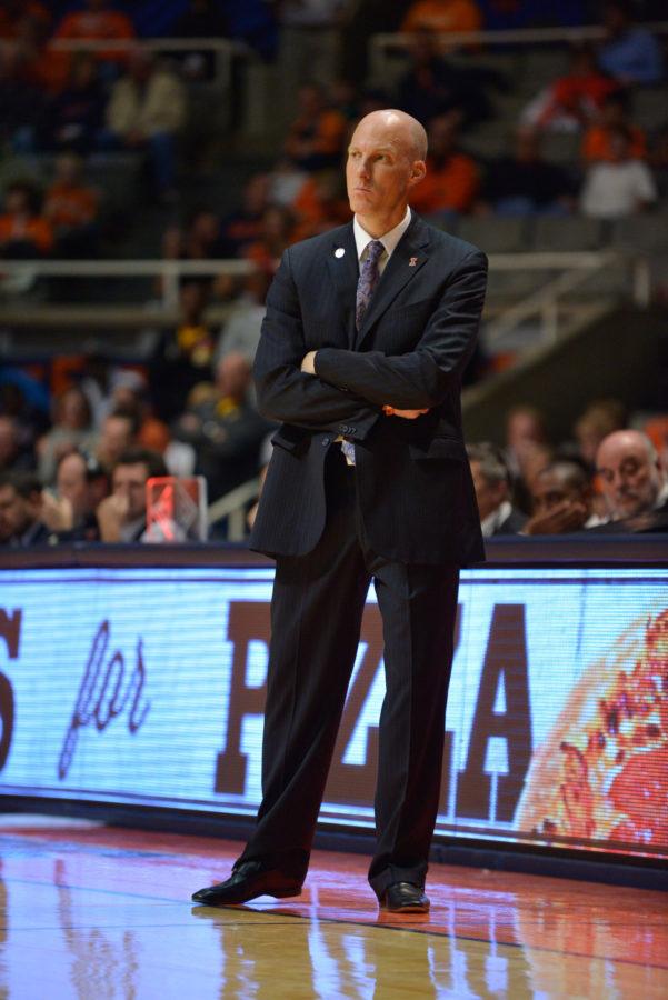 Illinois+head+coach+John+Groce+watches+the+exhibition+game+against+Quincy+at+State+Farm+Center+on+Friday%2C+Nov.+7%2C+2014.The+Illini+won+91-62.