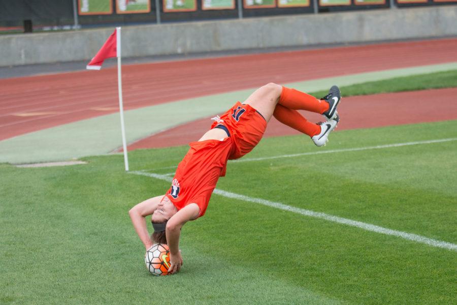 Nicole Breece performs a flip throw during Illinois 2-1 overtime victory against Maryland at Illinois Soccer and Track Stadium on Thursday.