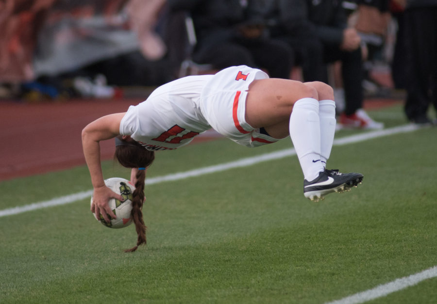 Nicole Breece performs a flip throw during the game against Ohio State at Illinois Soccer and Track Stadium on Friday. The game ended in a 1-1 tie.