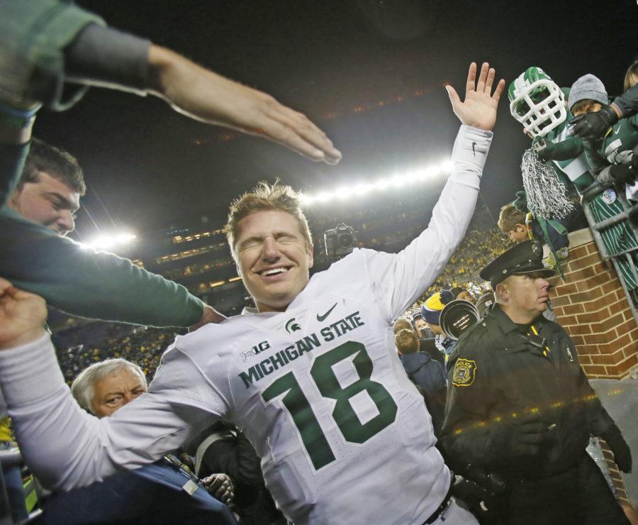 Michigan State quarterback Connor Cook leaving the field after a 27-23 win against Michigan on Saturday, Oct. 17, 2015, at Michigan Stadium in Ann Arbor, Mich. (Julian H. Gonzalez/Detroit Free Press/TNS)