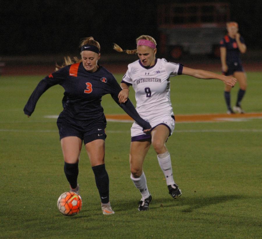 Jannelle Flaws keeping the ball away from Northwestern during the Illinois vs Northwestern game at The Illinois Soccer and Track Stadium on October 24, 2015. 