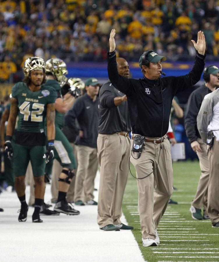 Baylor Bears head coach Art Briles gestures after a touchdown against the Michigan State Spartans in the second quarter at the Goodyear Cotton Bowl on Thursday, Jan. 1, 2015 at AT&amp;T Stadium. Michigan State won 42-41. (Richard W. Rodriguez/Fort Worth Star-Telegram/TNS) 