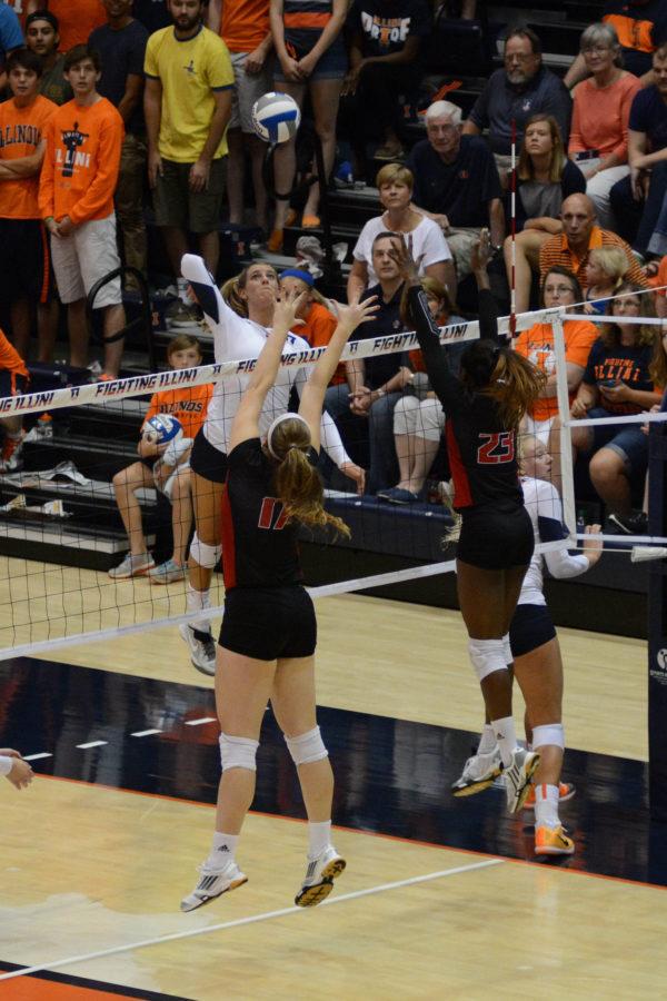 Illinois Jocelynn Birks (7) attempts to spike the ball during the game versus Louisville at Huff Hall on Friday, August 28, 2015.The Illini won 3-0.