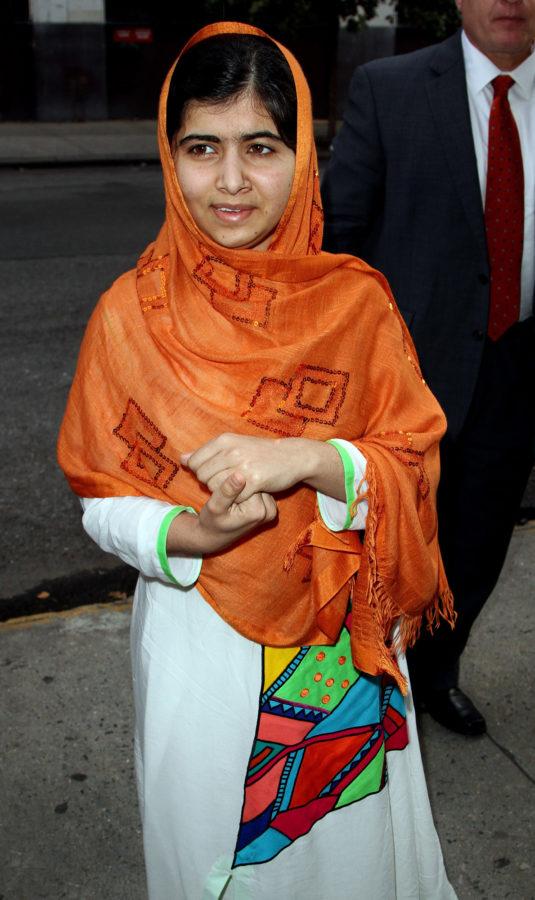 Malala Yousafzai, who is a leading contender to win the Nobel Peace Prize, arrives for an appearance on "The Daily Show with Jon Stewart" on Tuesday, October 8, 2013. Yousafzai was shot in the head and neck in a 2012 assassination attempt by Taliban gunmen, but has refused to be silenced as an advocate for educating Pakistani girls. (Zelig Shaul/Ace Pictures/Zuma Press/MCT)