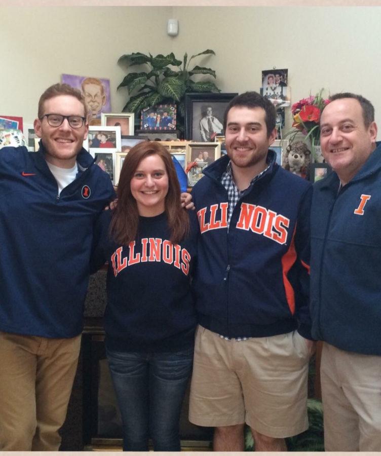 Delanie Steinweg (center left) comes from an Illini family. Her father, Ed (right), is a University alumnus, as well as her two brothers.