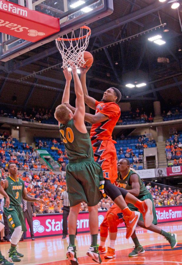 Mike Thorne Jr. takes the ball to the rim during the game against North Dakota State on Sunday at the Prairie Capitol Convention Center.