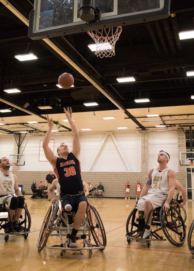 Illinois Derek Hoot (30) attempts a shot during the wheelchair basketball game v. Missouri at the ARC on Friday, Feb. 13, 2015. Illinois won 53-46.