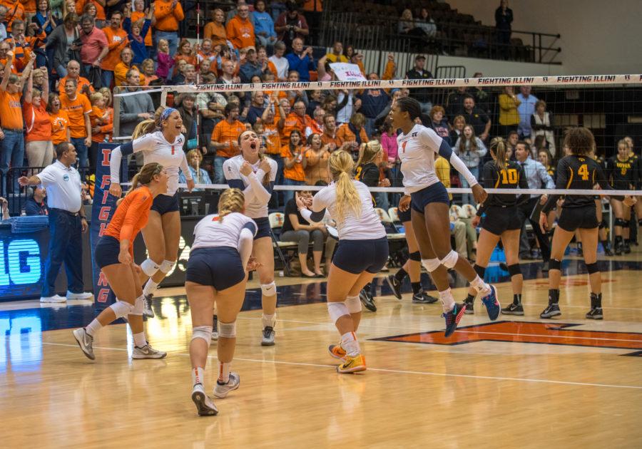 The team celebrates after beating Iowa by a score of 3-0 at Huff Hall on Friday night. This is Illinois first win in their last 5 games.