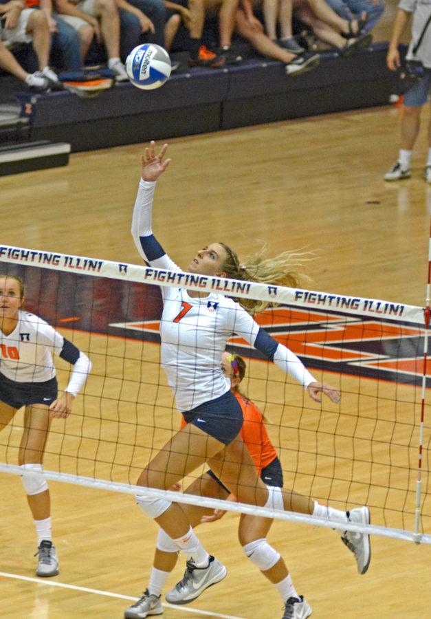 Illinois Jocelynn Birks (7) attempts to dink the ball during the game versus Louisville at Huff Hall on Friday, August 28, 2015.The Illini won 3-0.