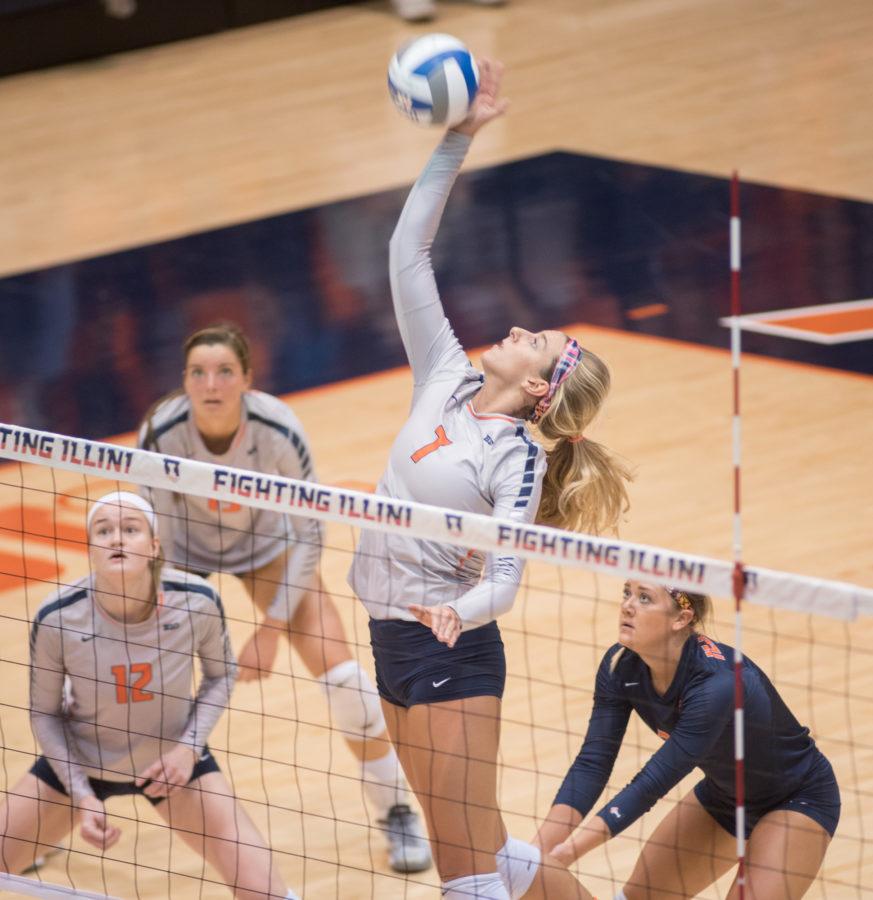 Jocelynn Birks spikes the ball during the game against Penn State at Huff Hall on Friday, October 9. Illinois lost 1-3.