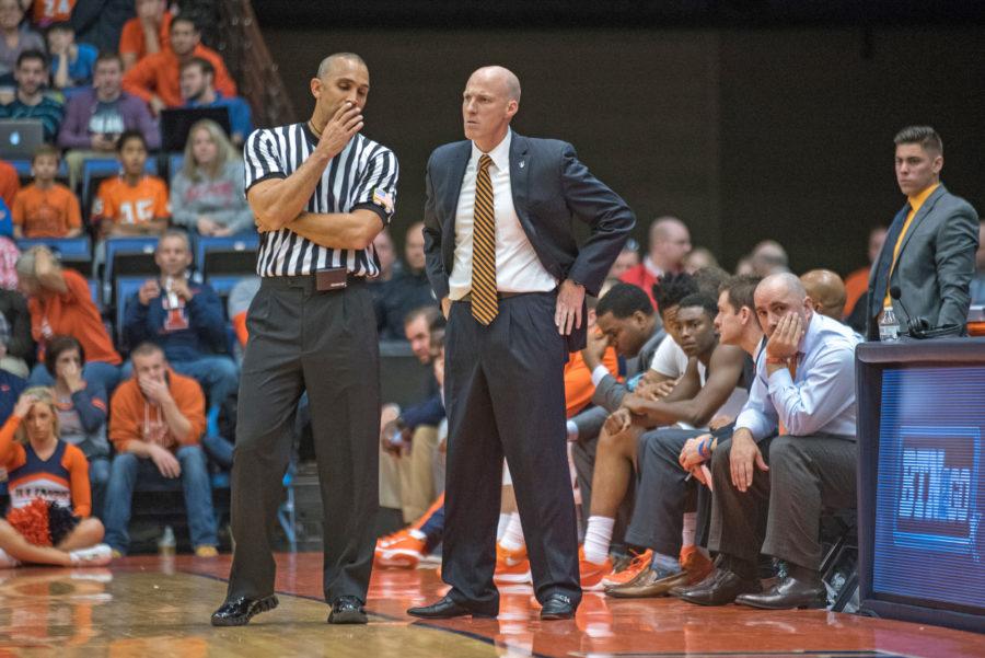 Head+coach+John+Groce+speaks+with+a+referee+during+the+game+against+North+Florida+at+the+Prairie+Capitol+Convention+Center+on+Friday%2C+Nov.+13.+Illinois+lost+93-81.