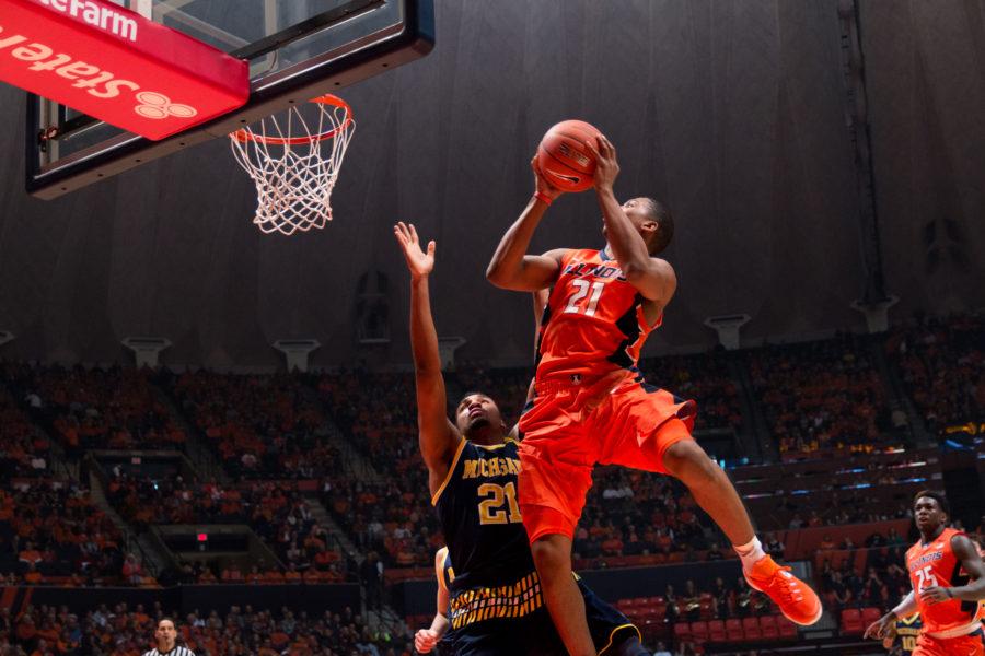 Malcolm Hill goes airborne while on a fast break during Illinois 78-68 loss to Michigan at State Farm Center on Wednesday.