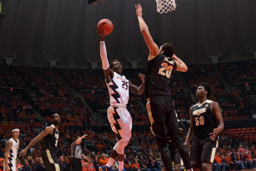 Illinois Kendrick Nunn puts up a layup over Purdues A.J. Hammond during the Illinis 84-70 victory over the Boilermakers at State Farm Center on Sunday. Nunn dropped 22 points in his first game back since missing time to attend the birth of his first child.