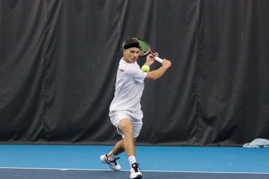Illinois Aron Hiltzik returns the ball during the match against Valparaiso at the Atkins Tennis Center on Friday, January 22, 2016. Illinois won 4-0.