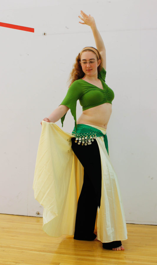 Kathleen Hawkin, Senior in Civil Engineering, shows a basic one step belly dancing move.
