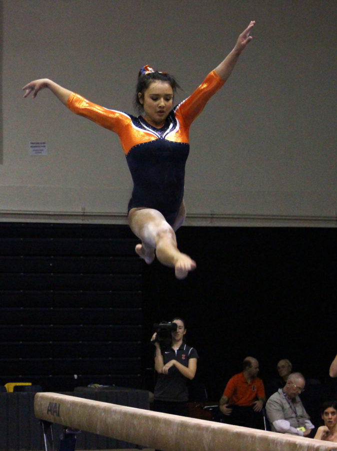 Lizzy LeDuc on the balance beam during the match against Michigan at Huff Hall on January 22, 2016. Michigan won 196.825 to 195.15.