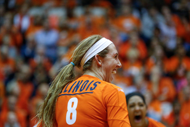 Illinois Alexis Viliunas (8) smiles after a point won during an NCAA Tournament first-round match against Morehead State at Huff Hall on Friday, Dec. 6, 2013. The Illini swept the Eagles, 3-0.