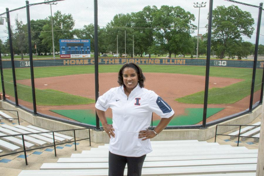 Tyra Perry, Illinois new womens softball head coach, poses in her new Illini gear at Eichelberger Field after a press conference on June 25.