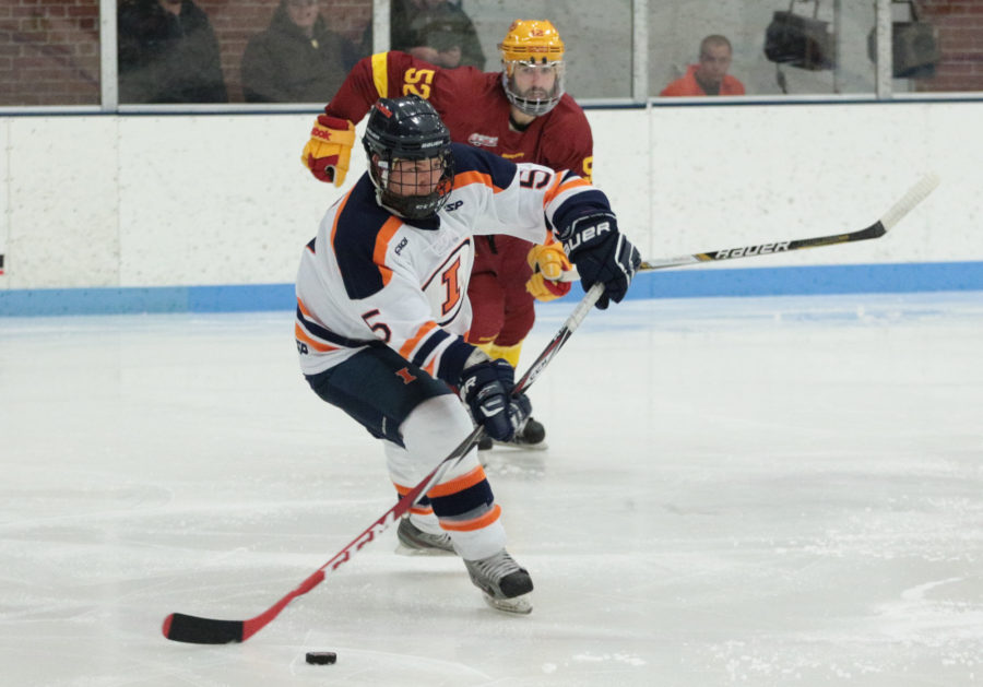 Illinois Joey Caprio goes for a pass during round one of the CSCHL hockey tournament v. Iowa State at the Ice Arena on Friday, Feb. 20, 2015. Illinois won 2-1.