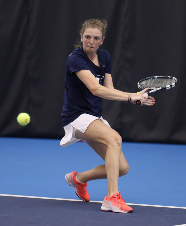 Illinois Alexis Casati attempts to return the ball during the match against Iowa at Atkins Tennis Center, on April 19, 2015. The Illini won 6-1.