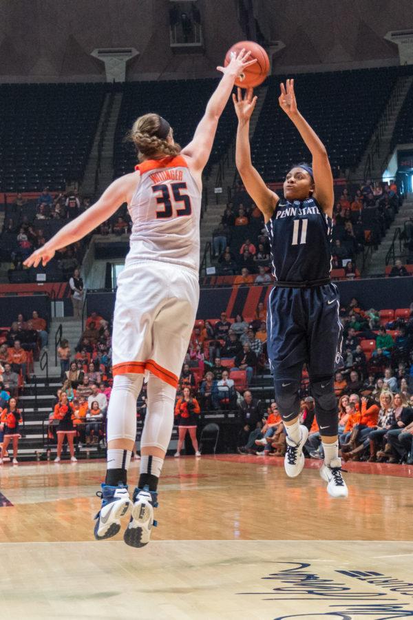 Penn States Teniya Page shoots a 3-pointer over Illinois Alex Wittinger. Teniya scored 17 points in the second half to help the Nittany Lions defeat the Illini 65-56 on Saturday, Jan. 23 at State Farm Center.