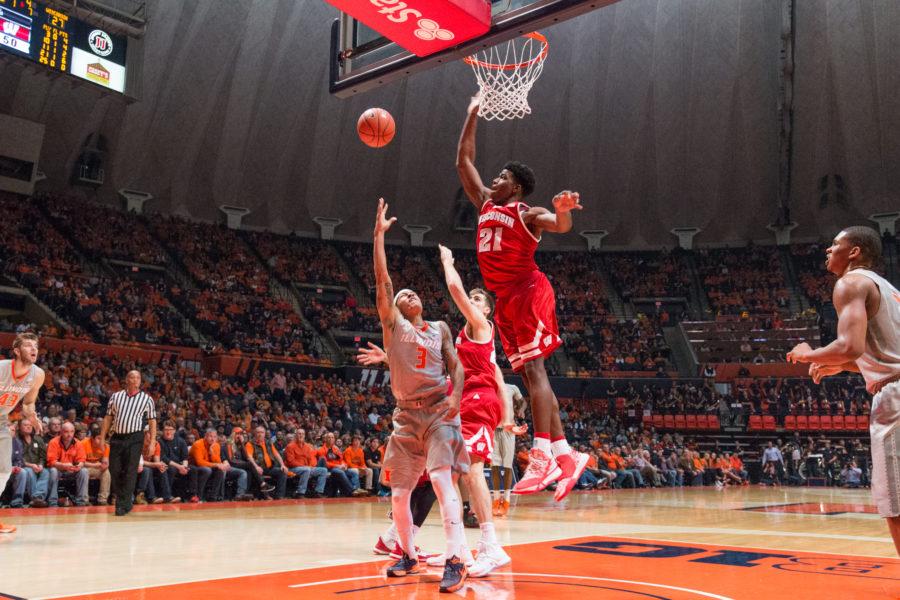 Wisconsins Khalil Iverson (21) attempt to block Illinois guard Khalid Lewis layup during the Illinis 63-55 loss to the Badgers at State Farm Center on Sunday, Jan. 31. The Illini have now lost three straight home games.