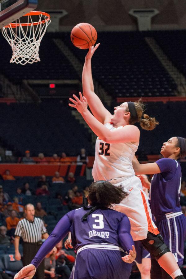 Illinois Chatrice White takes a layup over during the game against Northwestern at the State Farm Center on February 4. The Illini lost 69-59.