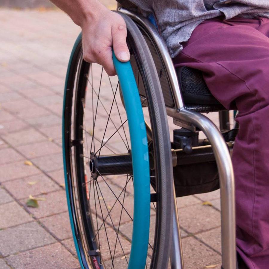 Pictured are examples of IntelliWheelss product Fit Grips, which make moving around more comfortable and easier for wheelchair users. Through IntelliWheelss website, people can customize the size and color their products.