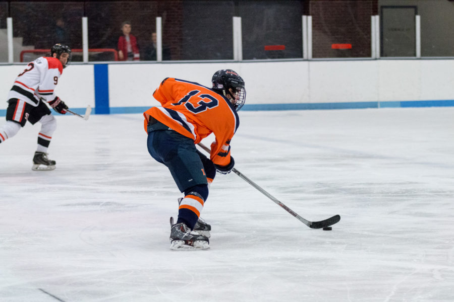 James McGing carries the puck down the ice during the game against Illinois State at the Ice Arena on February 12. The Illini won 5-2.