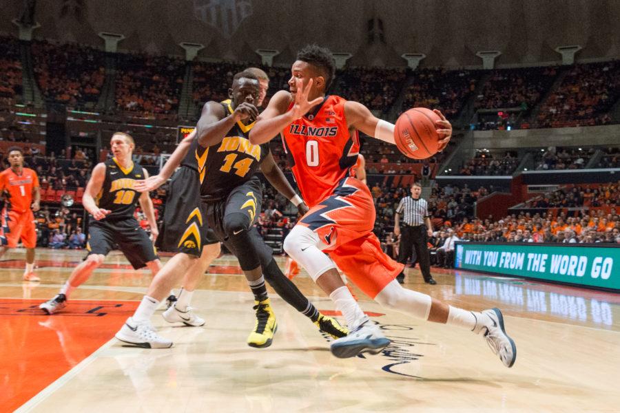 Illinois+D.J.+Williams+drives+to+the+basket+during+the+game+against+Iowa+at+the+State+Farm+Center+on+February+7.+The+Illini+lost+77-65.