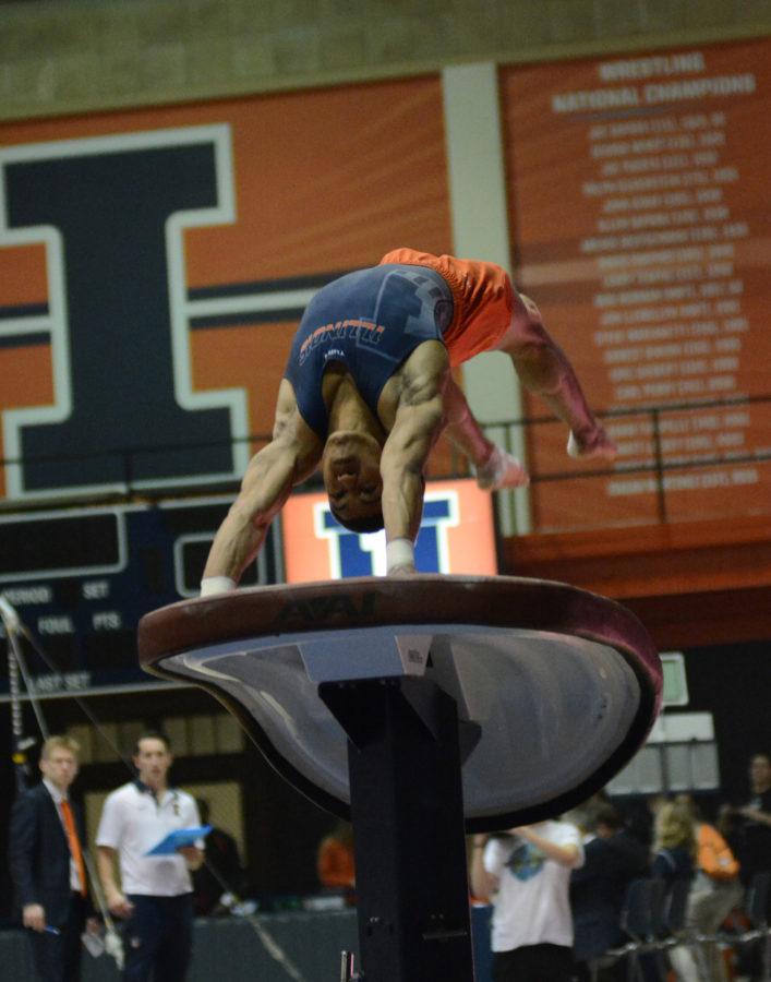 Illinois Chandler Eggleston performs a vault routine during the meet against Temple & UIC at Huff Hall on Saturday, Feb. 6, 2016.