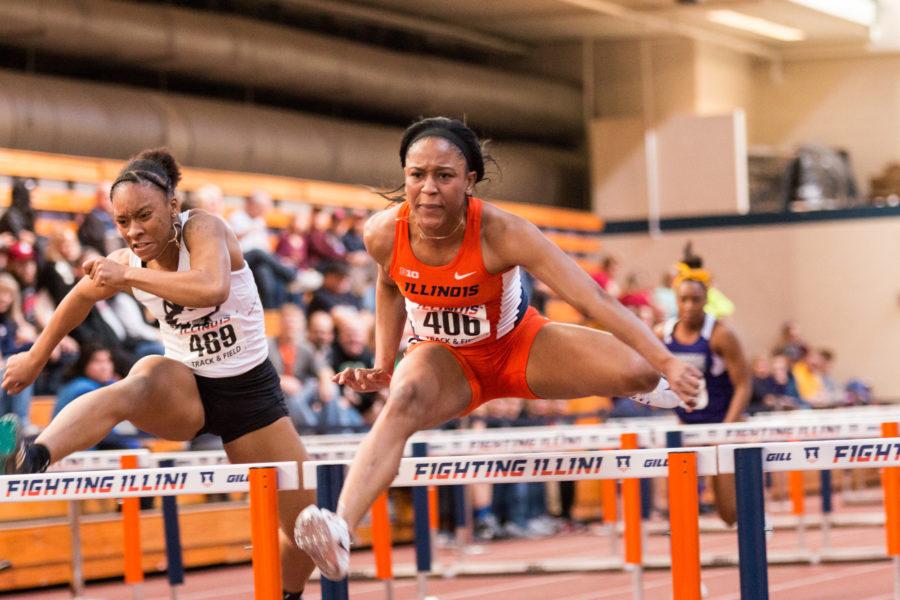 Illinois Pedrya Seymour leaps over a hurdle during the Orange and Blue meet on Saturday, February 20, 2016. Pedrya won the 60 meter hurdles with a time of 8.27 seconds.