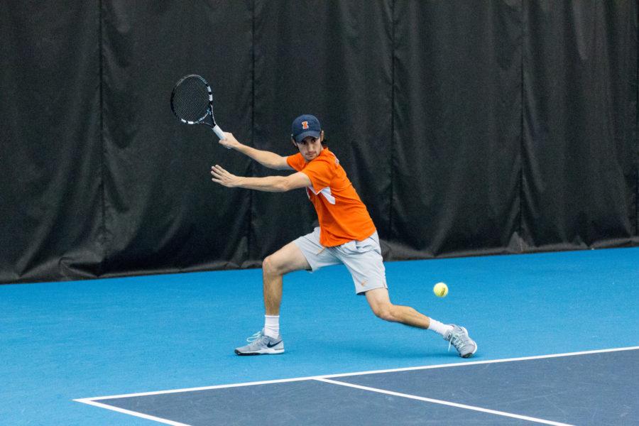 Illinois Alex Jesse lines up the ball during the match against Notre Dame at the Atkins Tennis Center on Friday, February 5. The Illini won 5-2.
