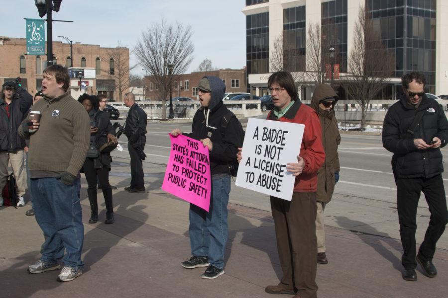 Citizens of the Champaign-Urbana district protest against the non-indictment of Champaign Police Department officer Matt Rush at the Champaign County Courthouse on Friday, Feb. 26, 2016.