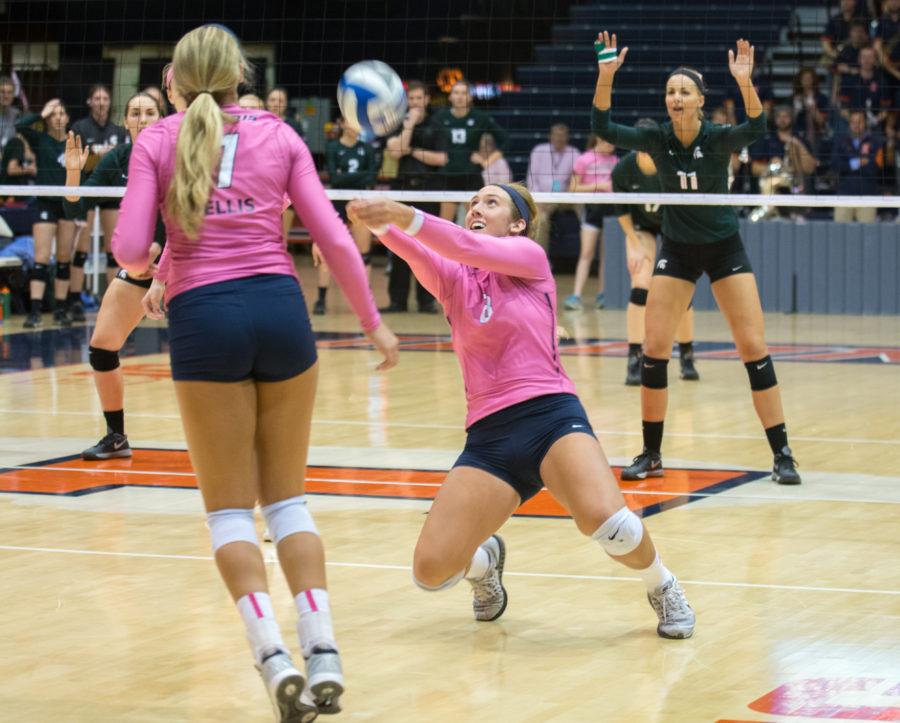 Alexis Viliunas bumps the ball during the game against Michigan State at Huff Hall on Friday, Oct. 30. Illinois won 3-1.