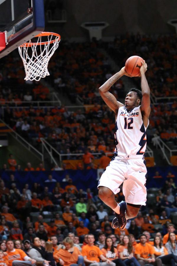 Illinois+Leron+Black+%2812%29+rises+for+a+dunk+to+finish+off+a+Jaylon+Tate+%281%29+ally-oop+pass+during+the+game+against+Kennesaw+State+at+State+Farm+Center+on+Dec.+27%2C+2014.+The+Illini+won+93-45.