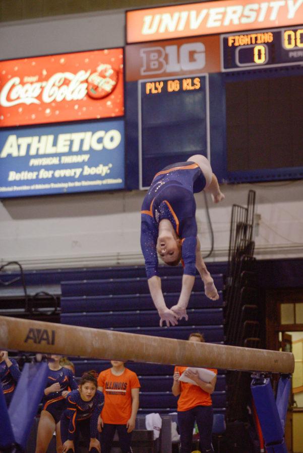 Illinois Mary Jane Horth performs a routine on the balance beam during the meet against Minnesota at Huff Hall on Saturday. The Illini won 195.775-195.375.