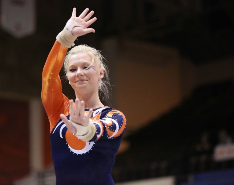 Erin+Buchanan+preforms+her+floor+exercise+routine+during+the+meet+against+Michigan+at+Huff+Hall+on+Friday.+The+Illini+lost+195.800-195.575.